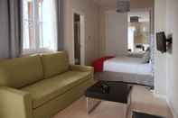 ห้องนอน Apartamentos Metrópolis Sevilla