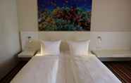 Kamar Tidur 7 Friendly City Hotel Oktopus