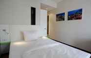 Kamar Tidur 6 Friendly City Hotel Oktopus