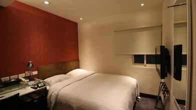 Bilik Tidur 4 Hotel Puri Ximen Branch