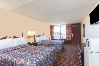 Phòng ngủ 4 Days Inn & Suites by Wyndham Pigeon Forge