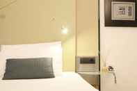 ห้องนอน Hotel Buonconsiglio