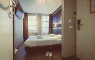 Kamar Tidur 4 Tourist Inn Budget Hotel - Hostel