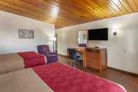 ห้องนอน Harmony Inn & Suites