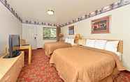 Phòng ngủ 7 Harmony Inn & Suites