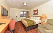 ห้องนอน 5 Harmony Inn & Suites