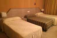 ห้องนอน Hotel Manzanares