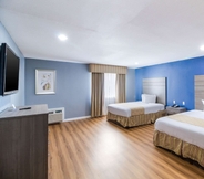 Phòng ngủ 3 Rodeway Inn & Suites