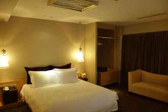 Kamar Tidur 4 Royal Tulip Luxury Hotels Carat - Guangzhou