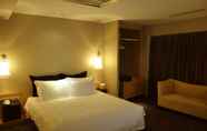 Bedroom 5 Royal Tulip Luxury Hotels Carat - Guangzhou