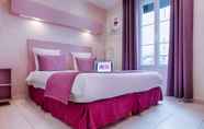 Bedroom 6 Pink Hotel