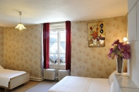 ห้องนอน Hostellerie du Cheval Blanc