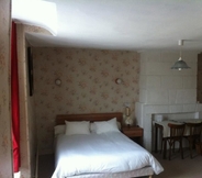 ห้องนอน 4 Hostellerie du Cheval Blanc
