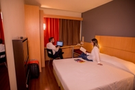 Bedroom Hus Hotel Dourados