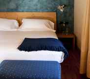 Bedroom 2 Hotel Meublè Sertorelli Reit
