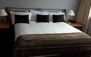 Kamar Tidur 4 Off Broadway Motel