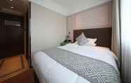 Kamar Tidur 4 GEM Hotel Wuning Road Zhenping Road Metro Station