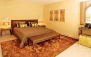 Bedroom 4 Amendoeira Golf Resort - Apartments and villas
