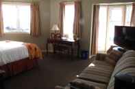 Bedroom Brigantine Inn & Suites