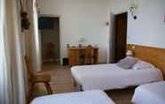 Bedroom 5 Queen Serenity Hotel