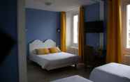 ห้องนอน 3 Queen Serenity Hotel