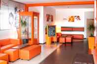 Lobby Orange Hotel und Apartments