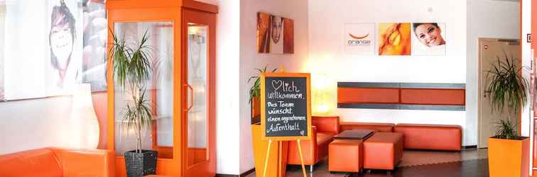 Lobby Orange Hotel und Apartments