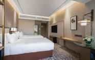 Bedroom 4 Minshan Lhasa Grand Hotel