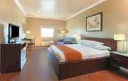 Bedroom 2 Lone Star Inn & Suites