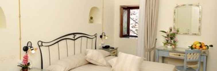 Phòng ngủ Locanda degli Dei