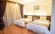 Bedroom 6 Ohana Phnom Penh Palace Hotel