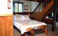 Kamar Tidur 6 Eastern Reef Cottages