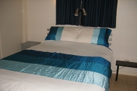 Phòng ngủ Ningaloo Bed and Breakfast