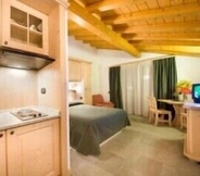 Bedroom 4 Boscone Suite Hotel