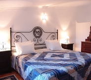 Phòng ngủ 6 Monte da Bravura Green Resort