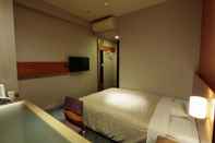 Kamar Tidur Candeo Hotels Sano