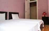 Kamar Tidur 5 Traveler's House Hotel