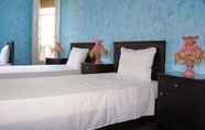 Kamar Tidur 4 Traveler's House Hotel