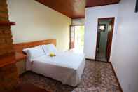 ห้องนอน Benko's Praia Hotel