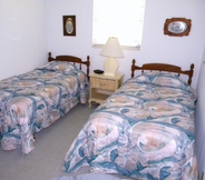 Kamar Tidur 6 Gulf Breeze Cottages