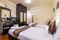 Kamar Tidur The Palm Garden Hotel