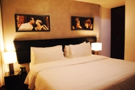 Kamar Tidur Hotel Charlotte Suite 26