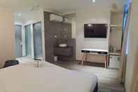 Kamar Tidur Sydney Riseon Hotel