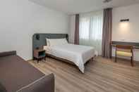 Kamar Tidur Hotel Canton dell Orto