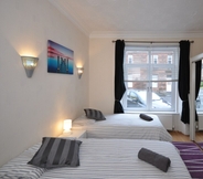 Bedroom 2 One Bedroom Apartment by Klass Living Serviced Accommodation Bellshill - Elmbank Street Apartment with WIFI  and Parking