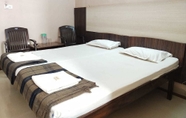 Kamar Tidur 4 iROOMZ Hotel Abhiman