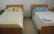 Bilik Tidur 5 B&B Tatti