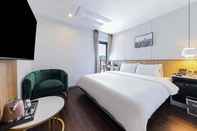 Kamar Tidur Gray 193 Hotel