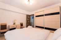 Kamar Tidur Beautiful and Bright Apartment