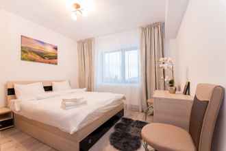 Kamar Tidur 4 Beautiful and Bright Apartment